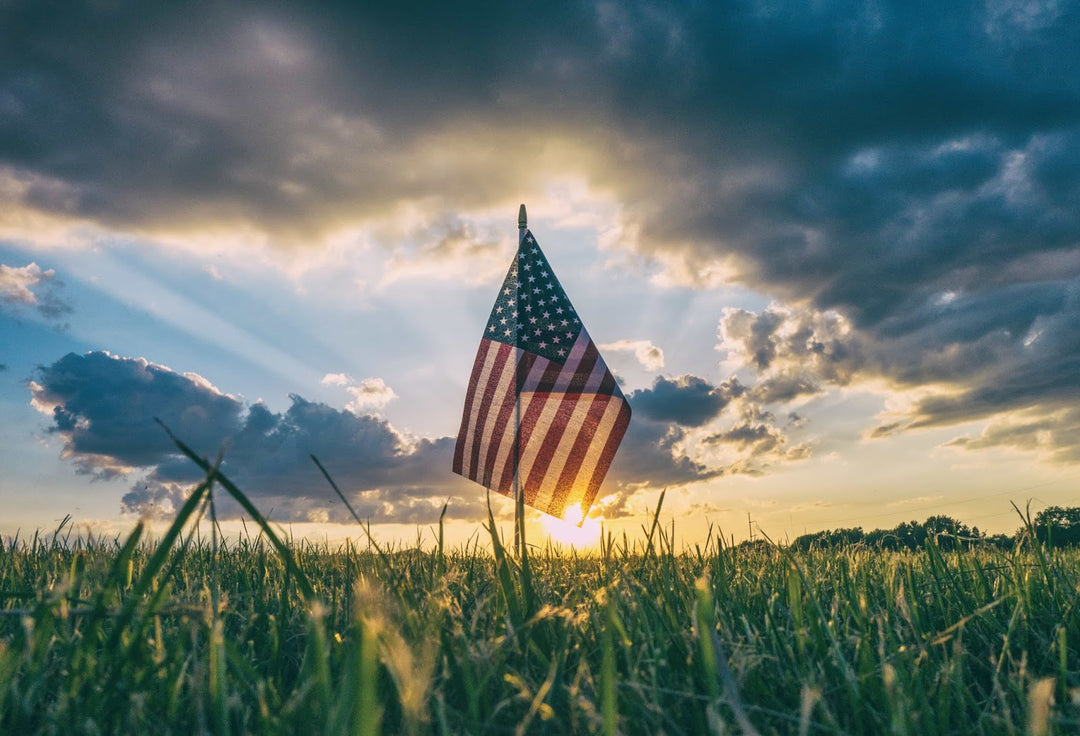 Patriotic USA Flag in front of a sunset, for NeuEve suppositories